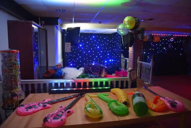 A decorated equipment and display setup inside a room